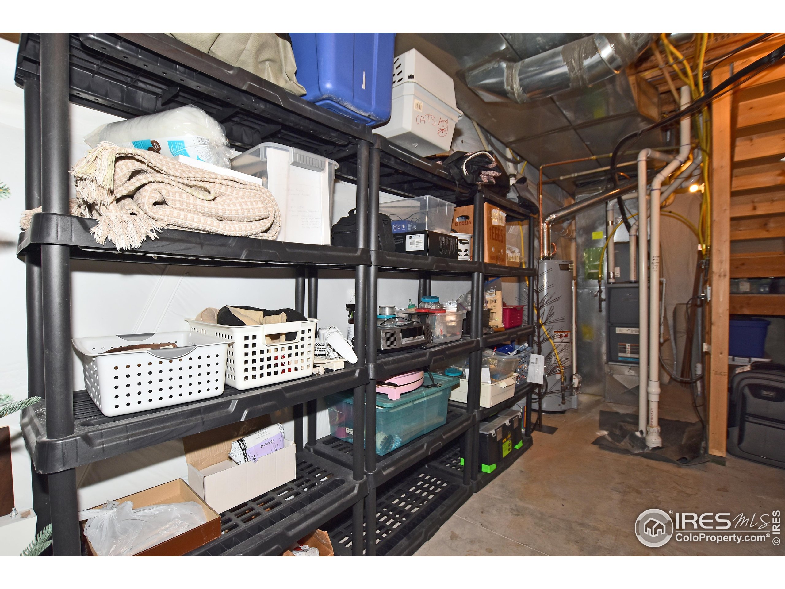 2172 Cape Hatteras Drive, Unit 2 Windsor, CO 80550 - Photo 39 of 46 a view of a porch with furniture and next to a yard