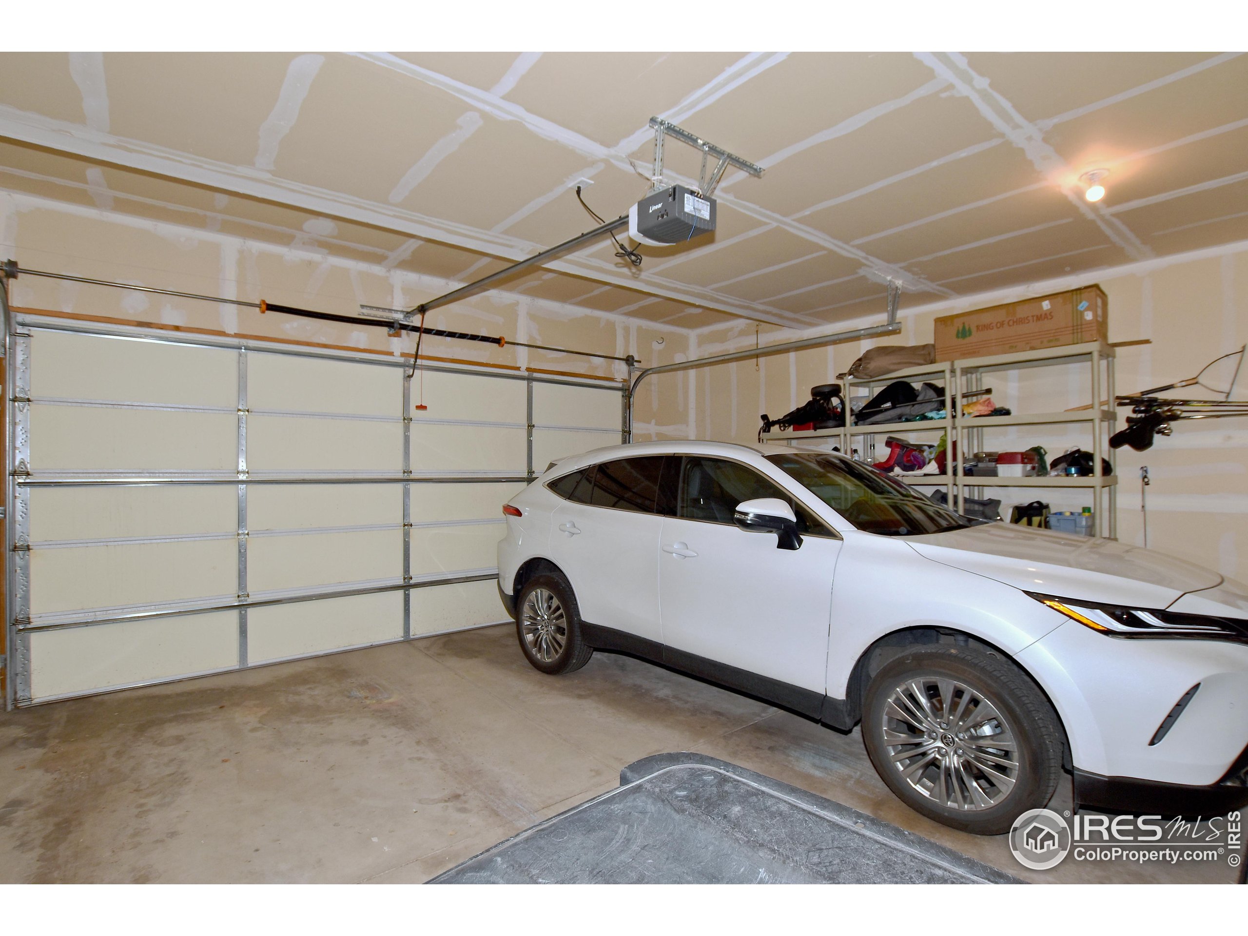 2172 Cape Hatteras Drive, Unit 2 Windsor, CO 80550 - Photo 40 of 46 a view of a car in garage