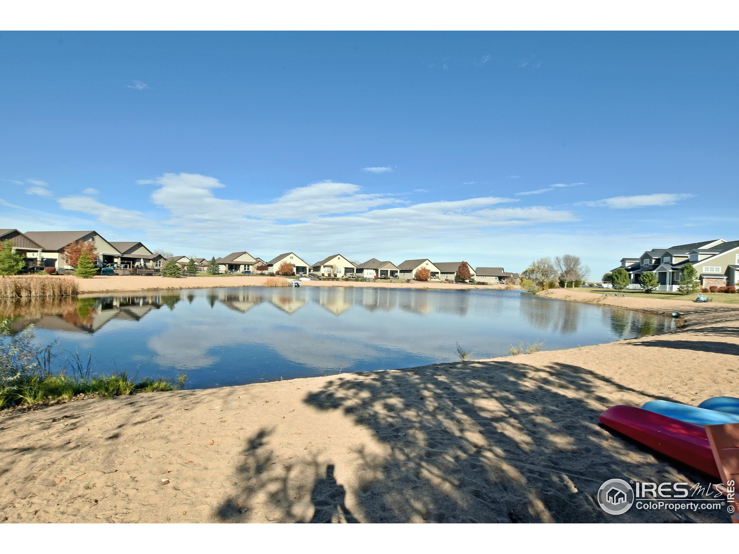 2172 Cape Hatteras Drive, Unit 2 Windsor, CO 80550 - Photo 43 of 46 a view of lake