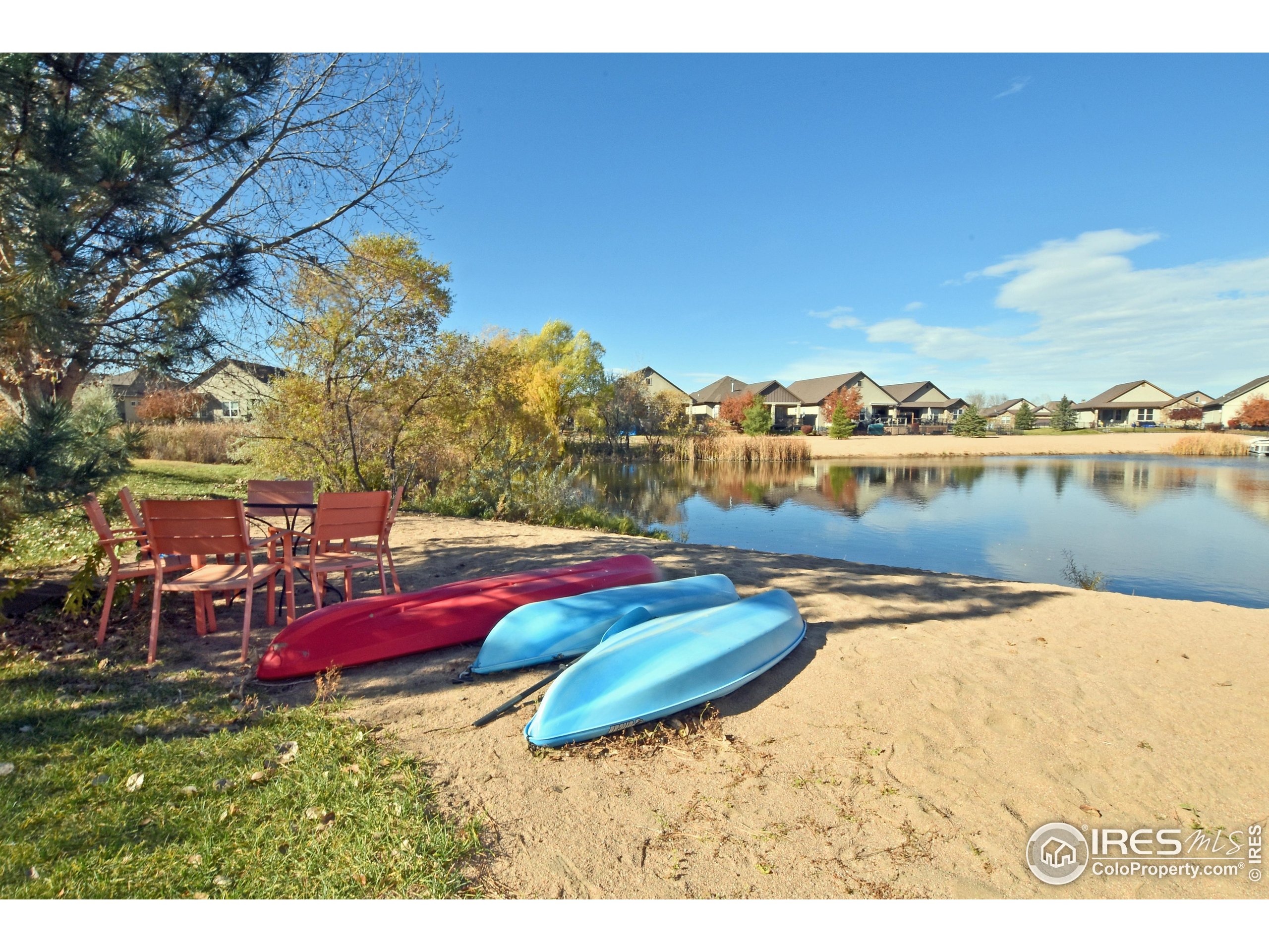 2172 Cape Hatteras Drive, Unit 2 Windsor, CO 80550 - Photo 44 of 46 a view of a swimming pool with an ocean view