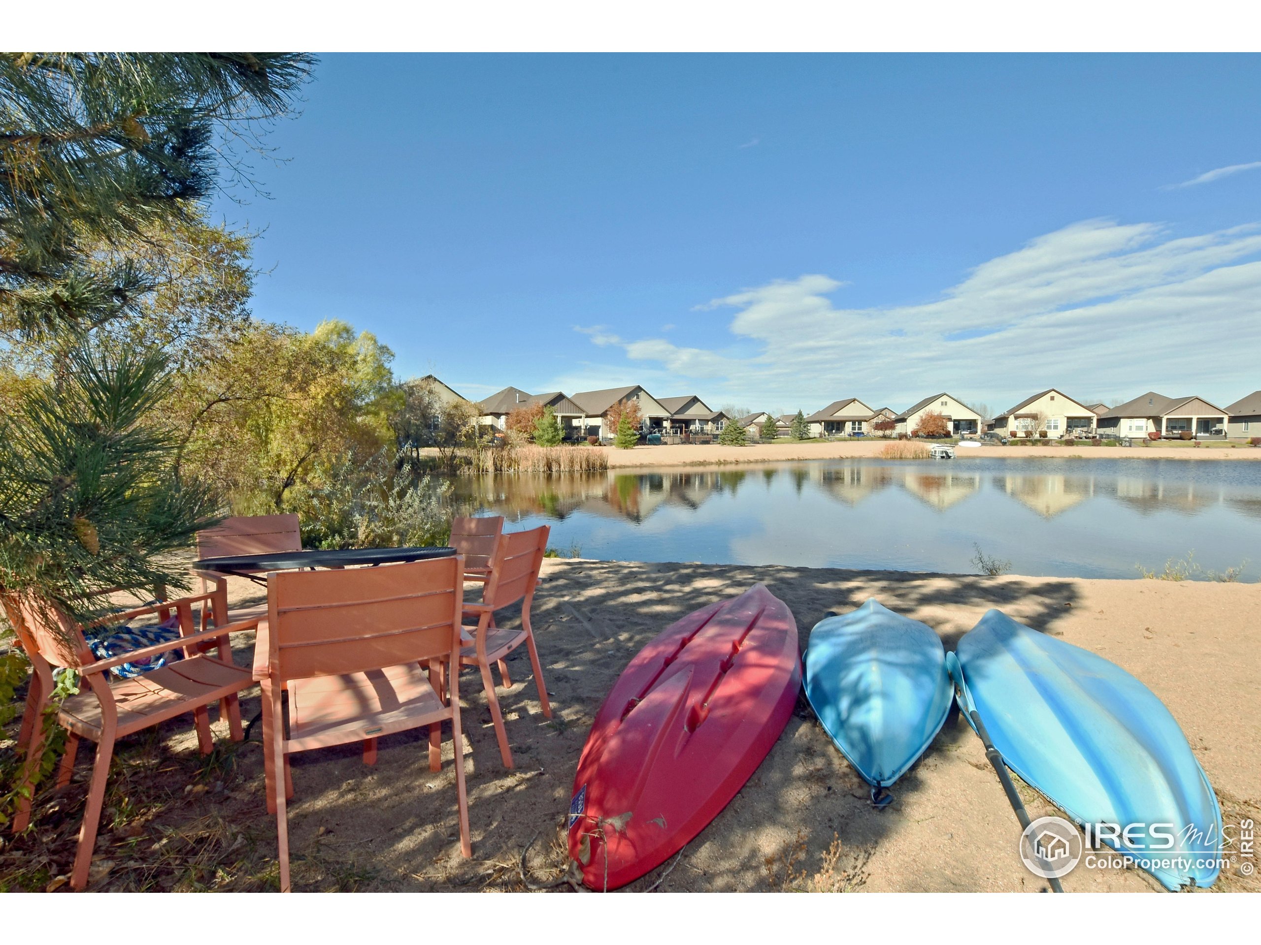 2172 Cape Hatteras Drive, Unit 2 Windsor, CO 80550 - Photo 45 of 46 a view of a chairs and table on the terrace
