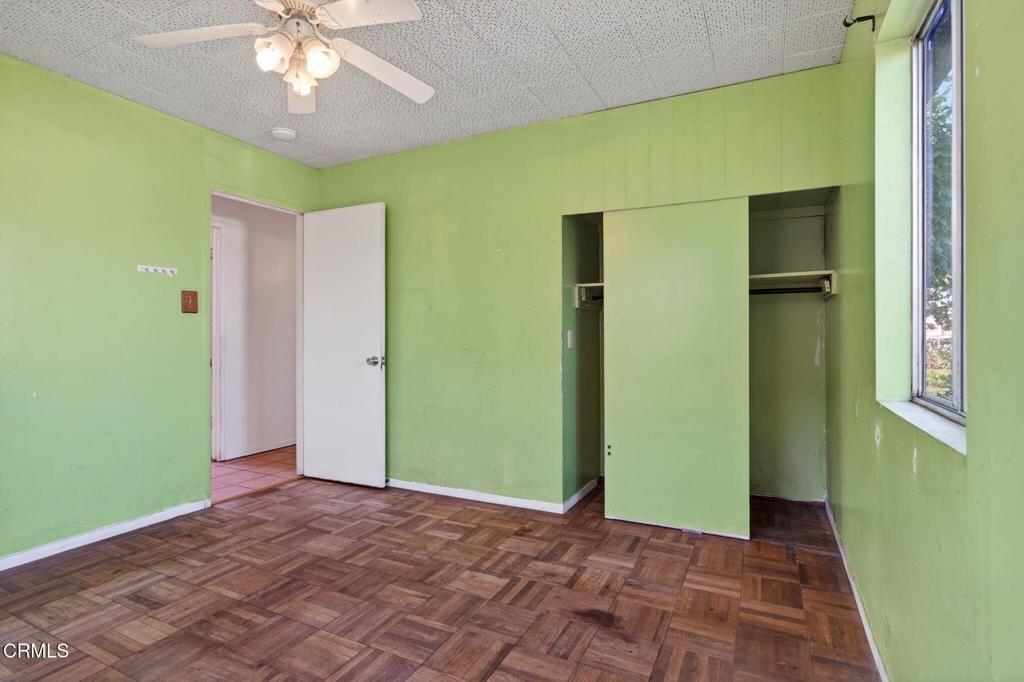 236 East Poplar Street Oxnard, CA 93033 - Photo 11 of 20 a view of a hallway with a yellow space