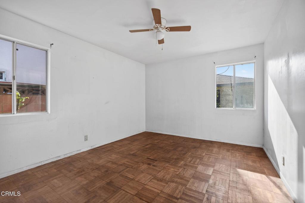 236 East Poplar Street Oxnard, CA 93033 - Photo 12 of 20 a view of an empty room with a window