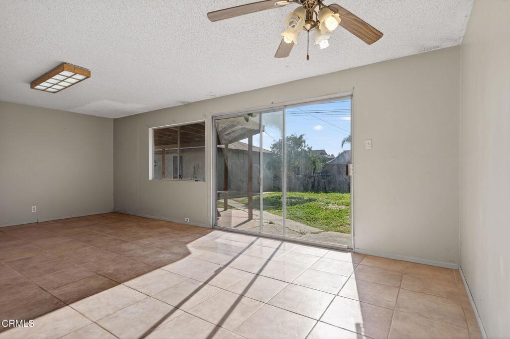 236 East Poplar Street Oxnard, CA 93033 - Photo 5 of 20 a view of backyard with window and entryway