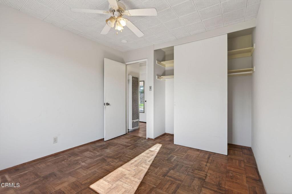 236 East Poplar Street Oxnard, CA 93033 - Photo 7 of 20 a view of a chandelier fan and entryway