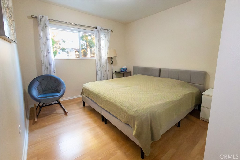 9551 Vía Ricardo Burbank, CA 91504 - Photo 12 of 29 a bed sitting in a bedroom next to a window