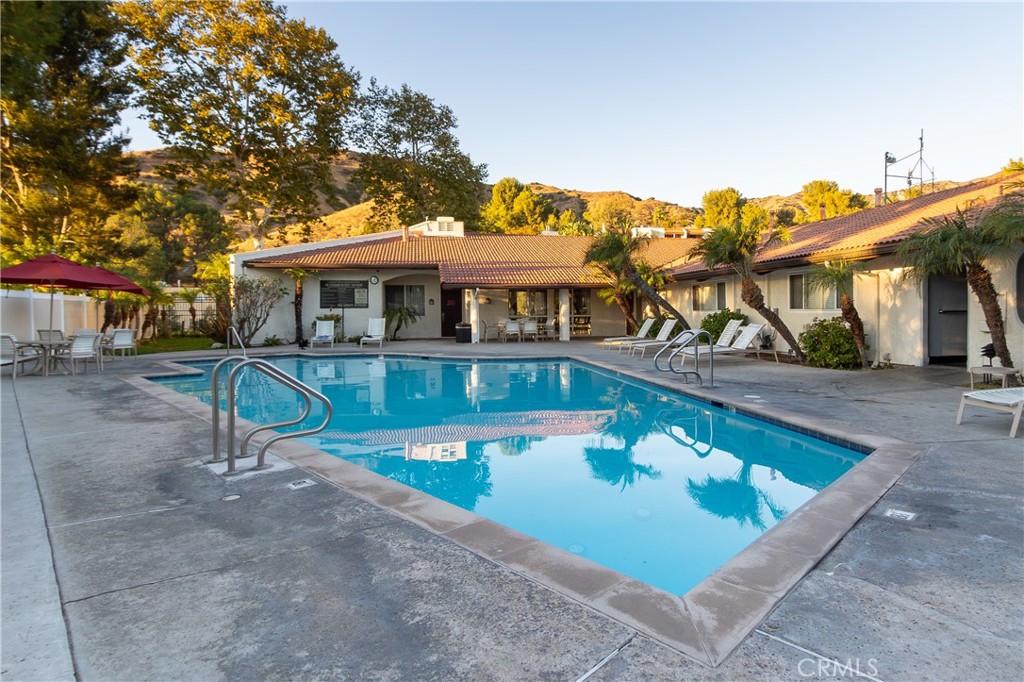 9551 Vía Ricardo Burbank, CA 91504 - Photo 25 of 29 front view of a house with a yard