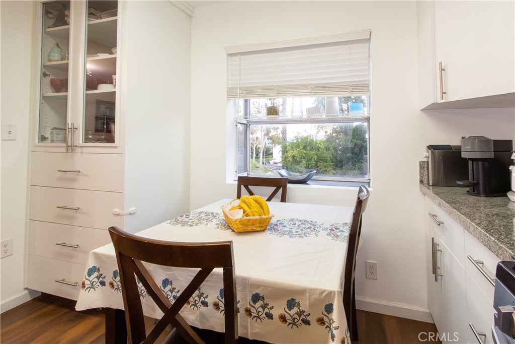 9551 Vía Ricardo Burbank, CA 91504 - Photo 9 of 29 a view of a dining room with furniture window and wooden floor