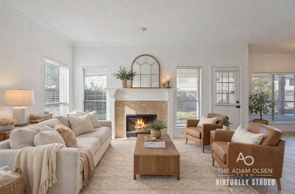 a living room with furniture and a fireplace