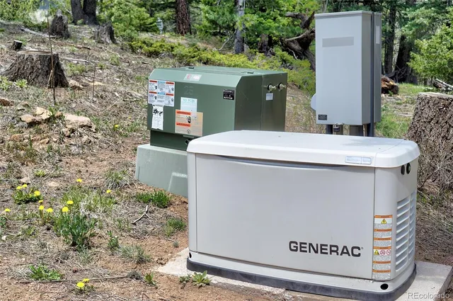 a view of a balcony with wooden floor and fence