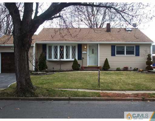 81 Westminster Road Colonia, NJ 07067 - Photo 1 of 9 a view of a house with a yard