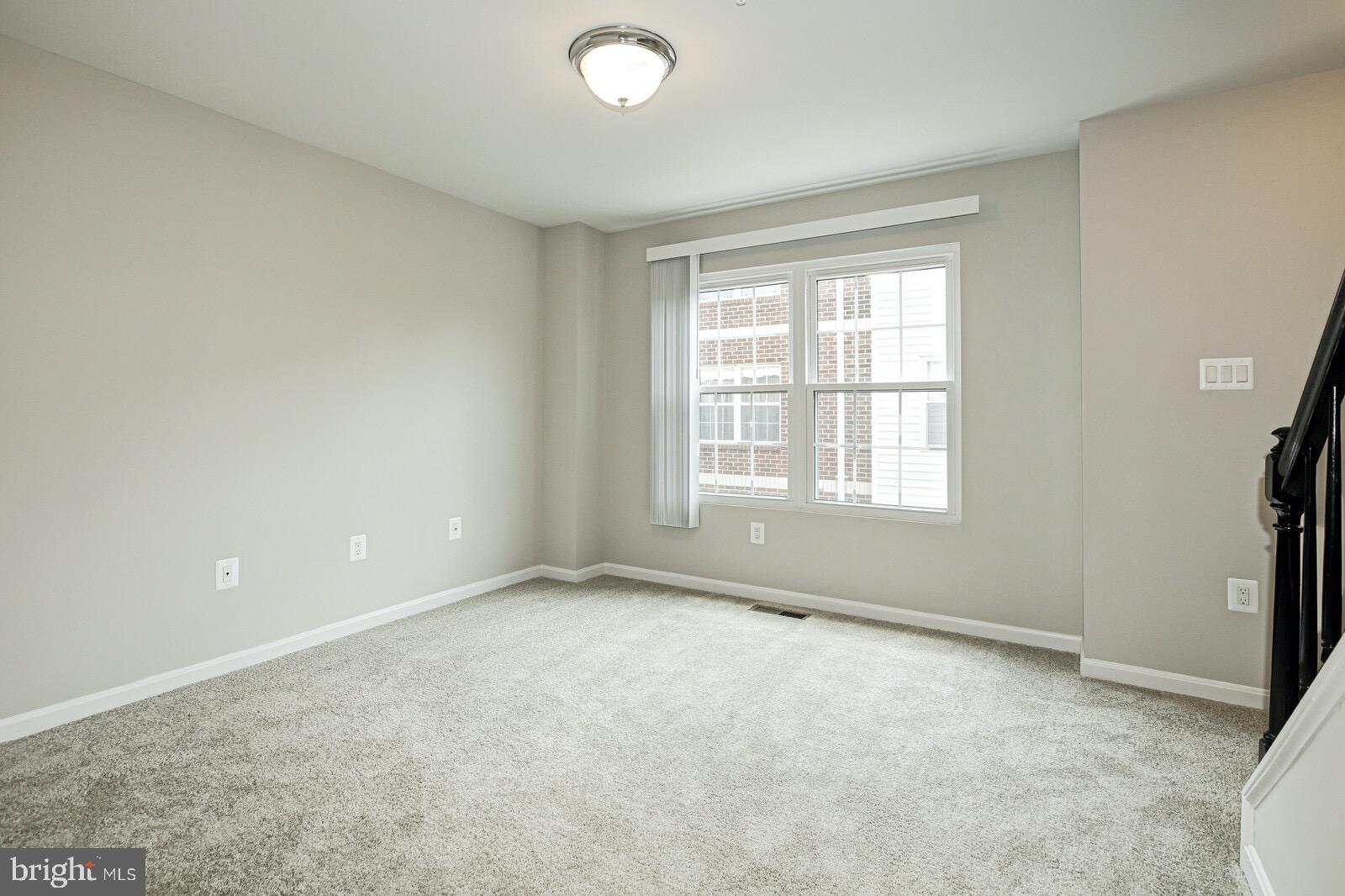 3002 South Glebe Road Arlington, VA 22206 - Photo 13 of 31 a view of an empty room with a window