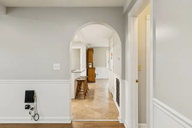 a kitchen with stainless steel appliances granite countertop a refrigerator sink and stove