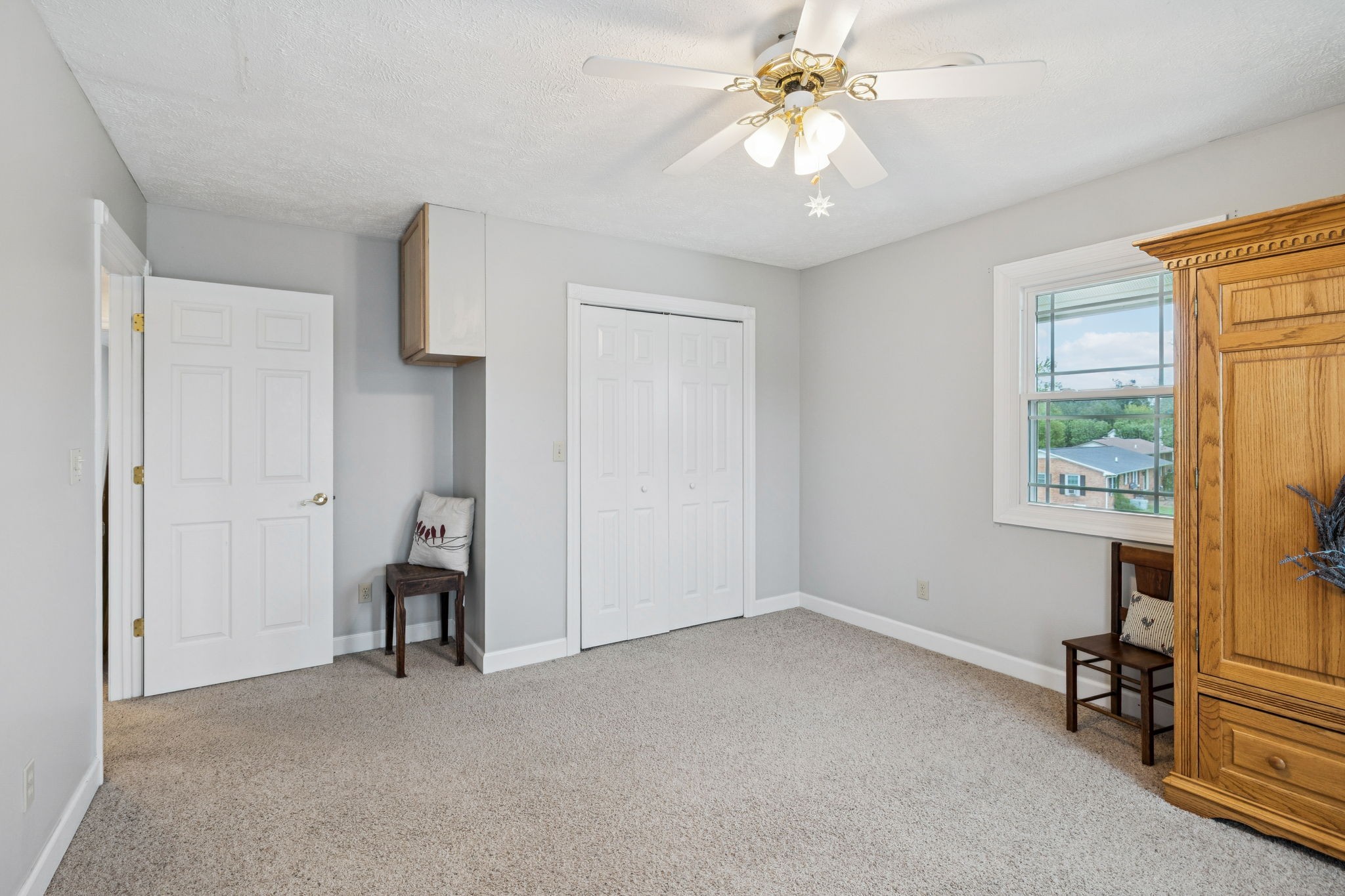 106 Highland Street Hohenwald, TN 38462 - Photo 36 of 85 an empty room with windows and fan