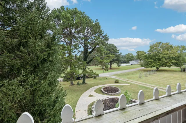 a bathroom with a sink and a yard