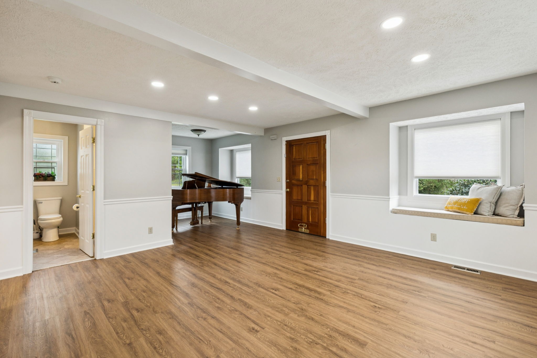106 Highland Street Hohenwald, TN 38462 - Photo 7 of 85 a view of livingroom with hardwood and furniture