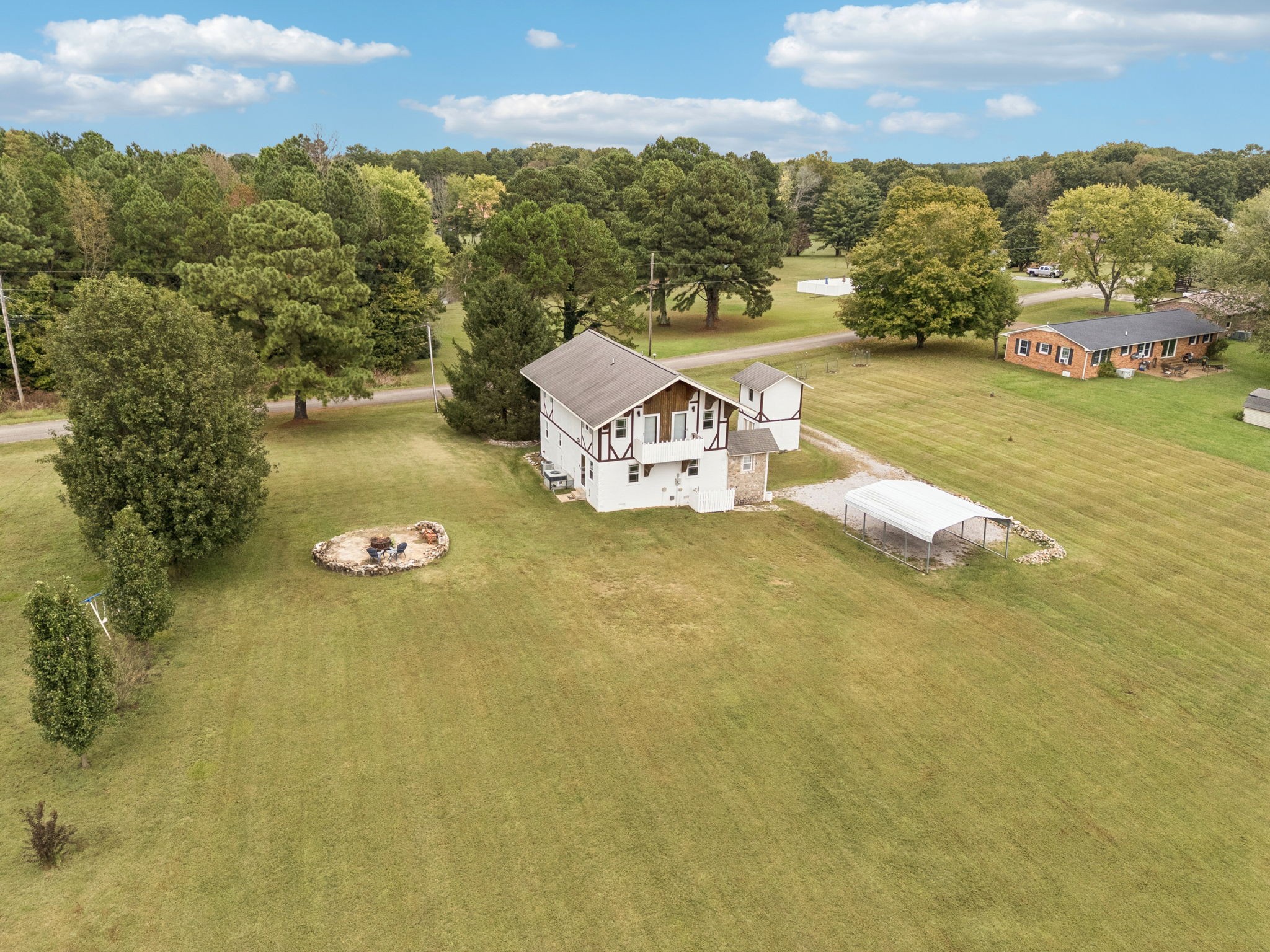 106 Highland Street Hohenwald, TN 38462 - Photo 78 of 85 a view of a lake with a mountain