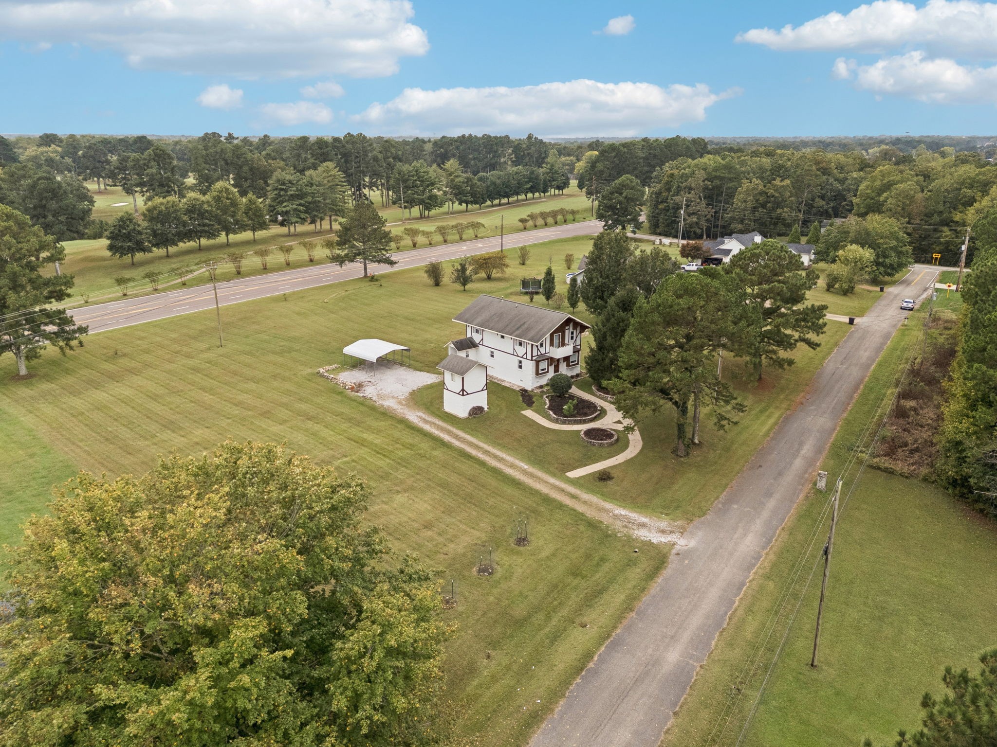 106 Highland Street Hohenwald, TN 38462 - Photo 84 of 85 a view of a lake with a mountain