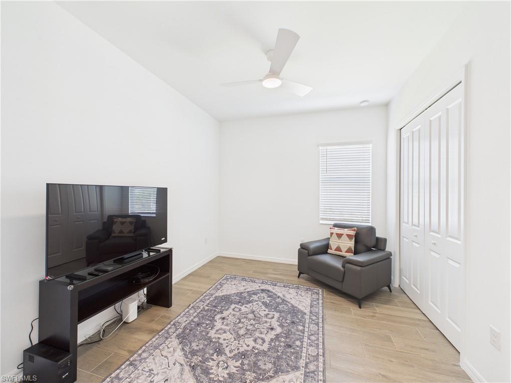 5412 Fancourt Links Way Ave Maria, FL 34142 - Photo 27 of 39 Sitting room featuring light wood finished floors and a ceiling fan