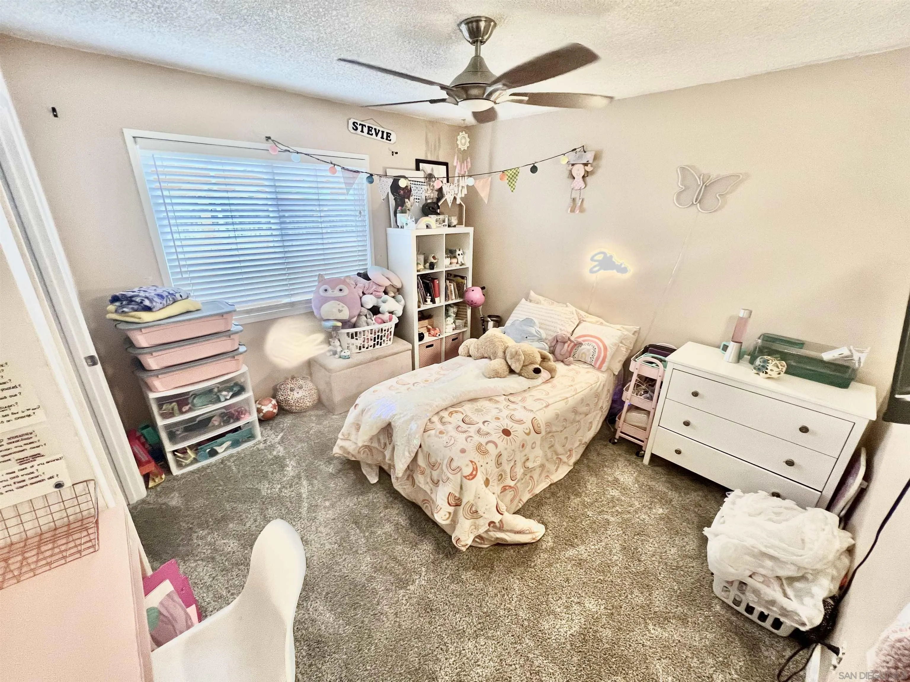 1663 Buckeye Drive El Cajon, CA 92021 - Photo 12 of 20 a bed room with a bed and a chair