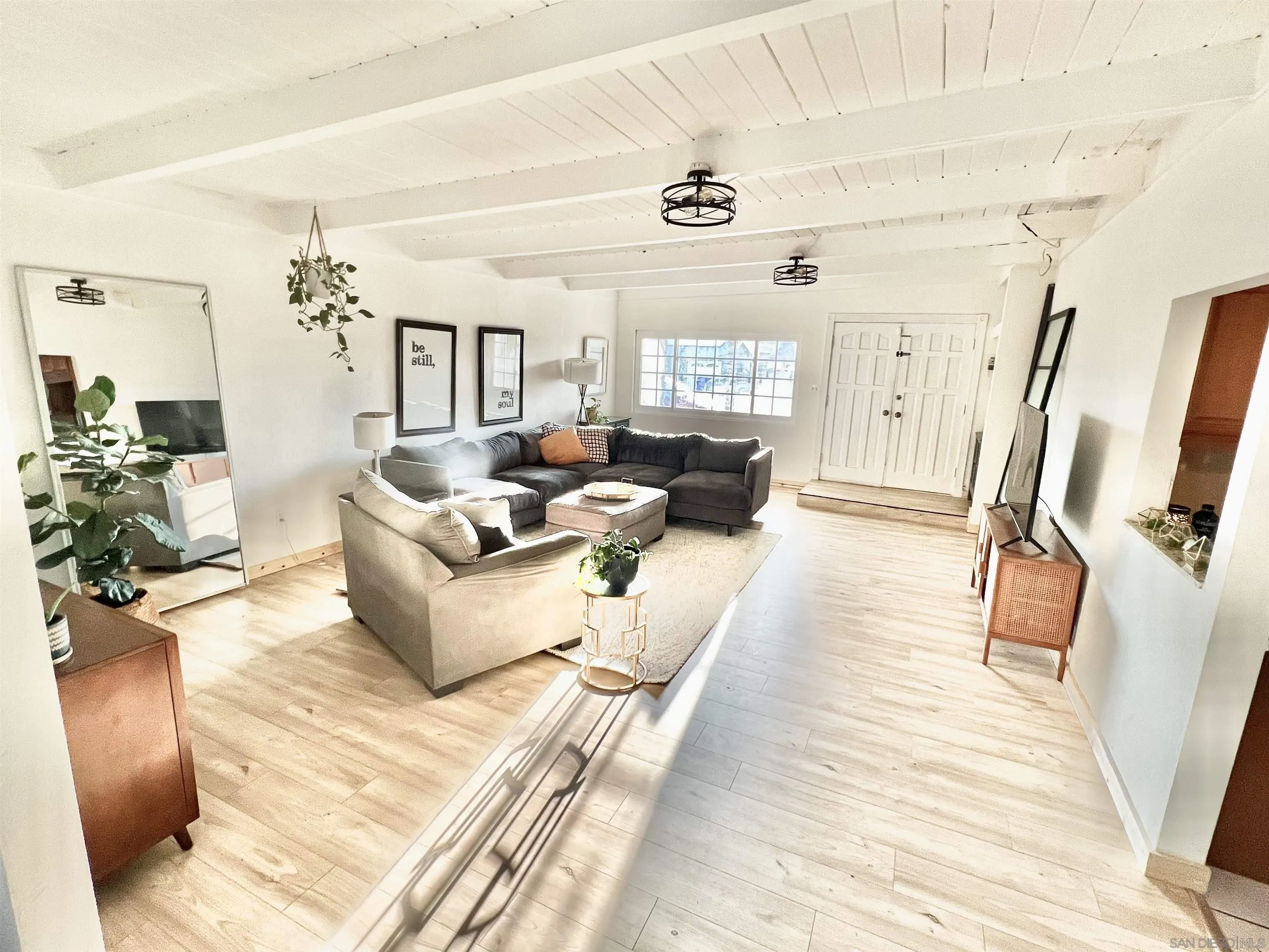 1663 Buckeye Drive El Cajon, CA 92021 - Photo 4 of 20 a living room with furniture and a large window