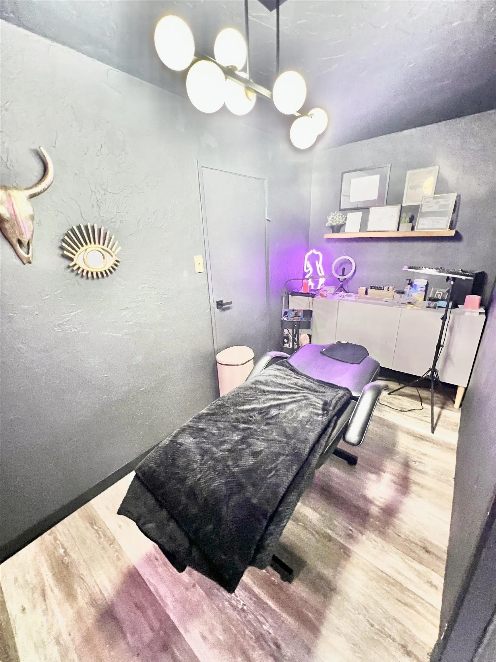 1663 Buckeye Drive El Cajon, CA 92021 - Photo 10 of 20 a bedroom with a bed and chandelier