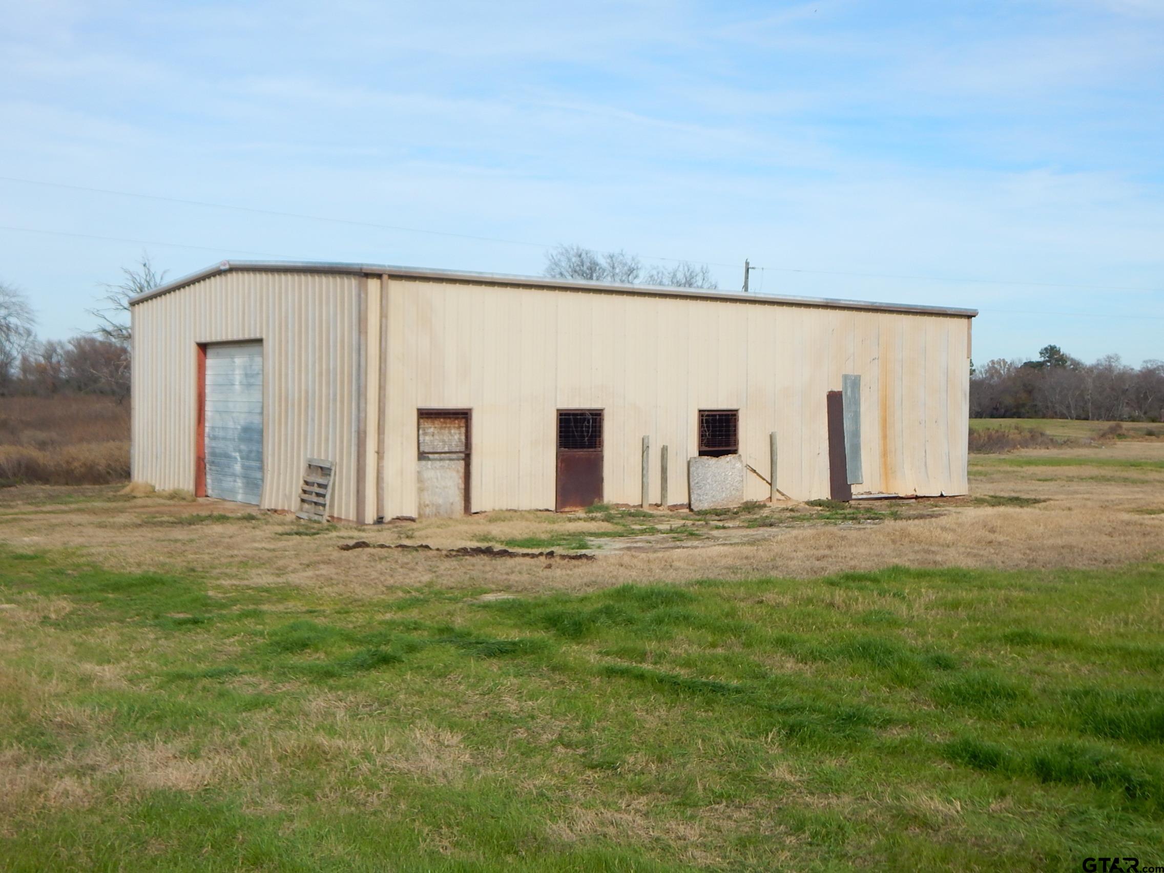 74 Acres Elderberry Road Gilmer, TX 75644 - Photo 5 of 16 a view of a house with backyard and road