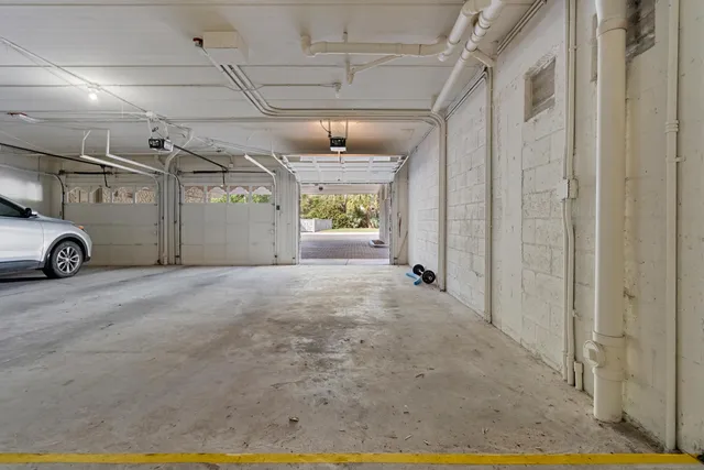 a view of swimming pool with outdoor seating and plants