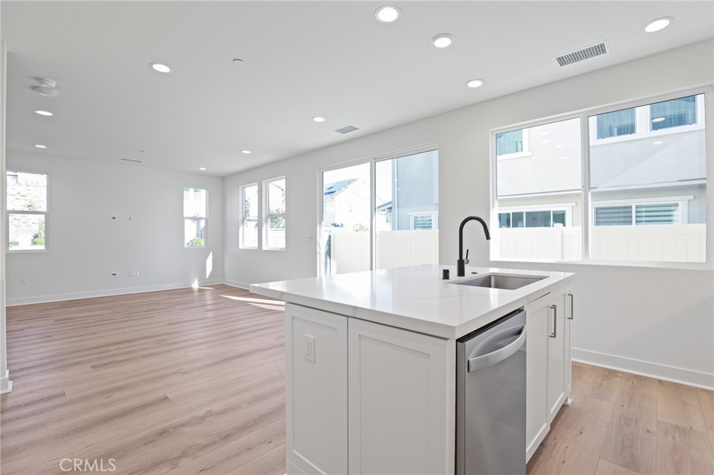 732 Jasper Street Rancho Mission Viejo, CA 92694 - Photo 11 of 28 a kitchen with sink and window