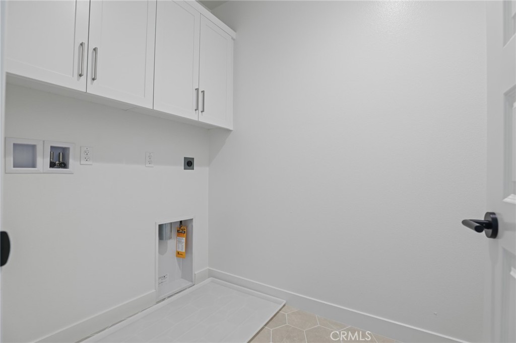 732 Jasper Street Rancho Mission Viejo, CA 92694 - Photo 26 of 28 a view of storage and utility room with window