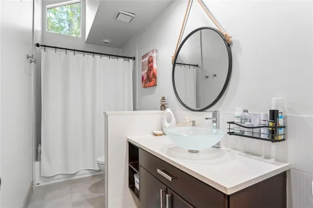a utility room with washer and dryer