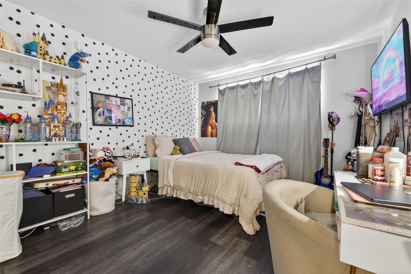 13189 Southwest 9th Lane Miami, FL 33184 - Photo 18 of 24 a bedroom with bed and a couch