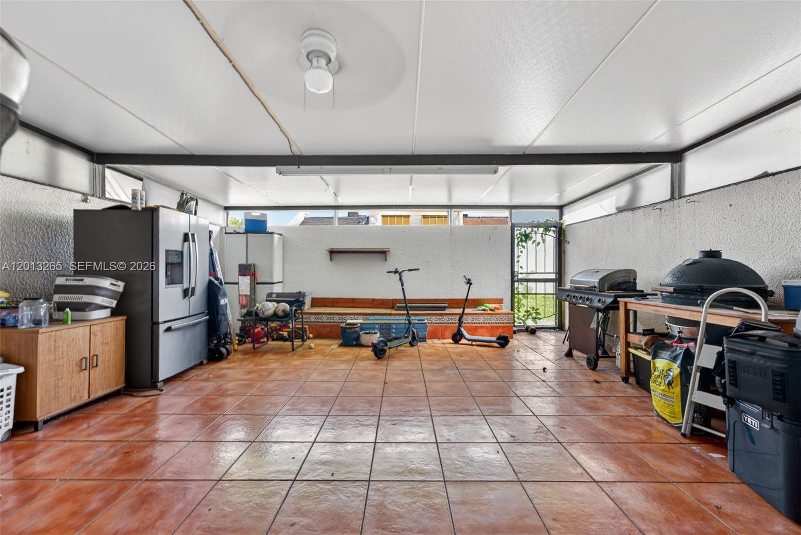 13189 Southwest 9th Lane Miami, FL 33184 - Photo 20 of 24 a view of a room with gym equipment