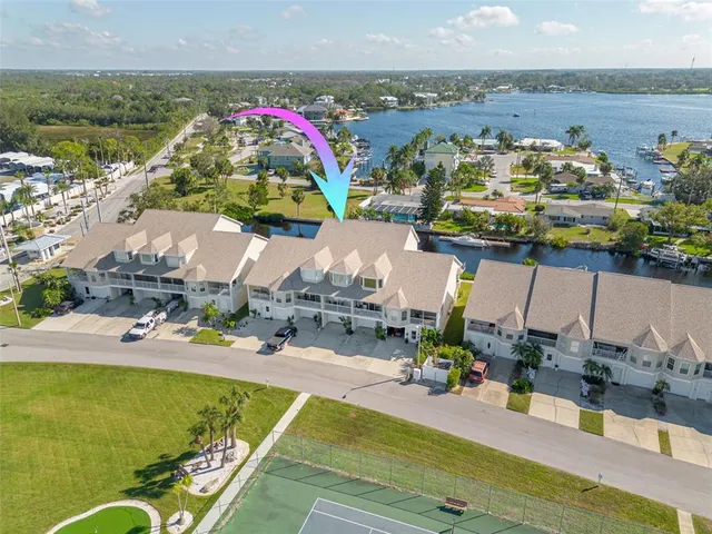 a view of a house with a potted plant