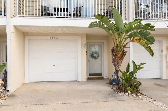 a kitchen with a stove a sink and a refrigerator