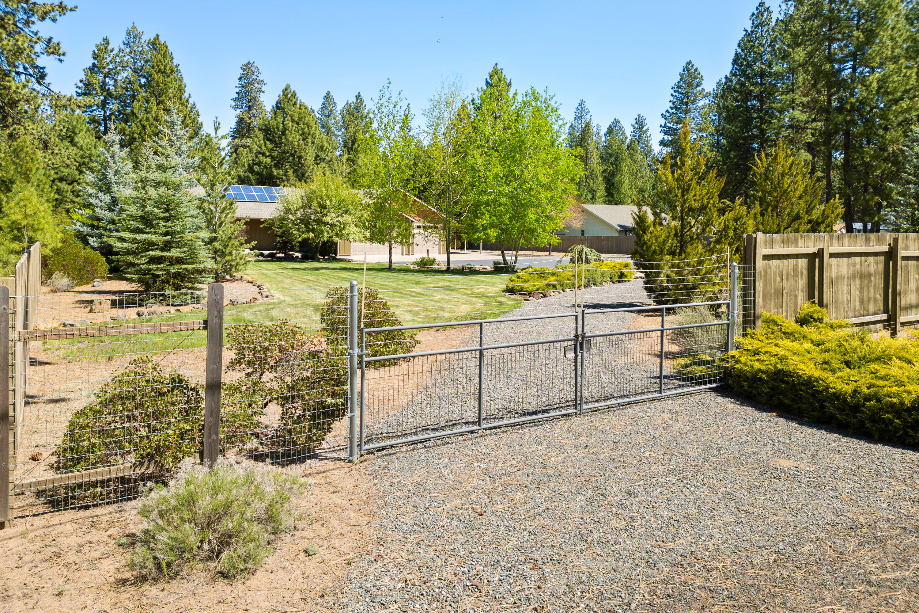 19236 Kiowa Road Bend, OR 97702 - Photo 46 of 52 Gated west entrance with circular driveway exit
