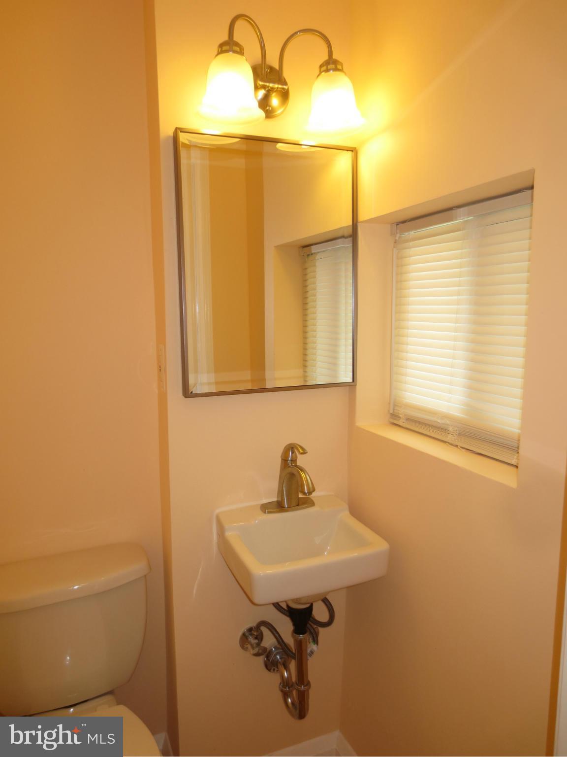 1524 Medford Road Baltimore, MD 21218 - Photo 9 of 28 First Floor Powder Room