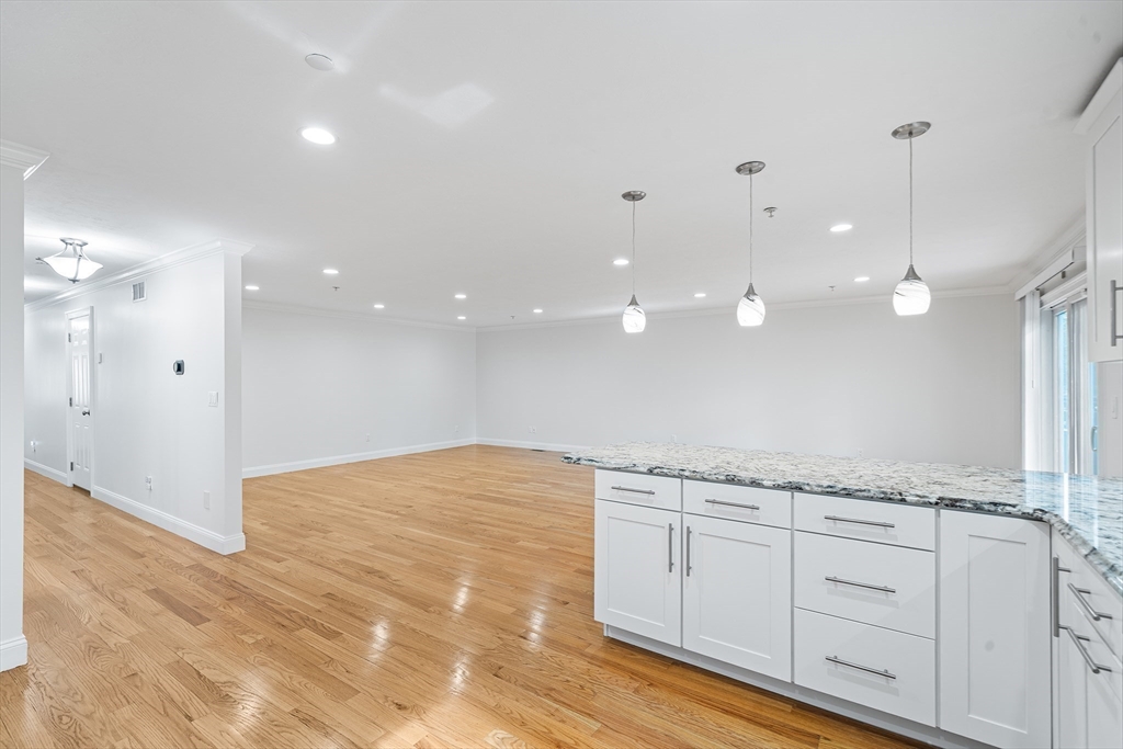 215 Rangeway Road, Unit 31 Billerica, MA 01862 - Photo 10 of 40 a view of an empty room and kitchen view