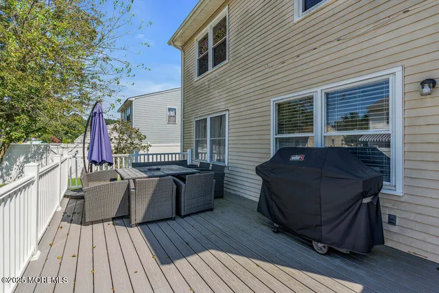 a view of a couches on the roof deck