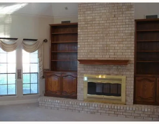 a living room with a fireplace