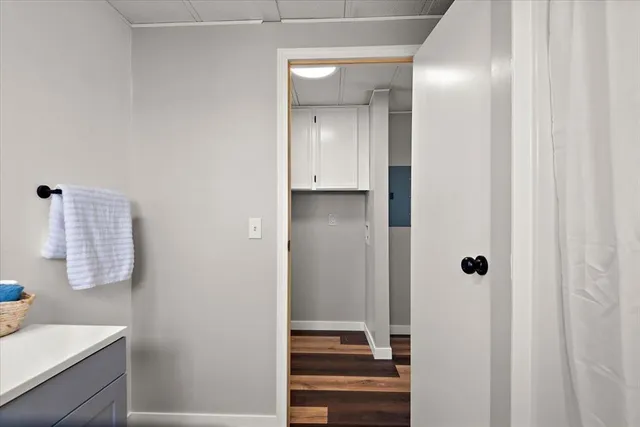 a bathroom with a sink and mirror