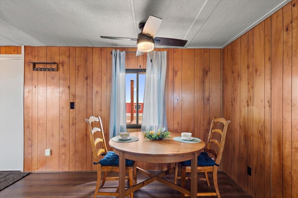 37155 East Jones Road Yoder, CO 80864 - Photo 38 of 48 a view of a dining room with furniture and window