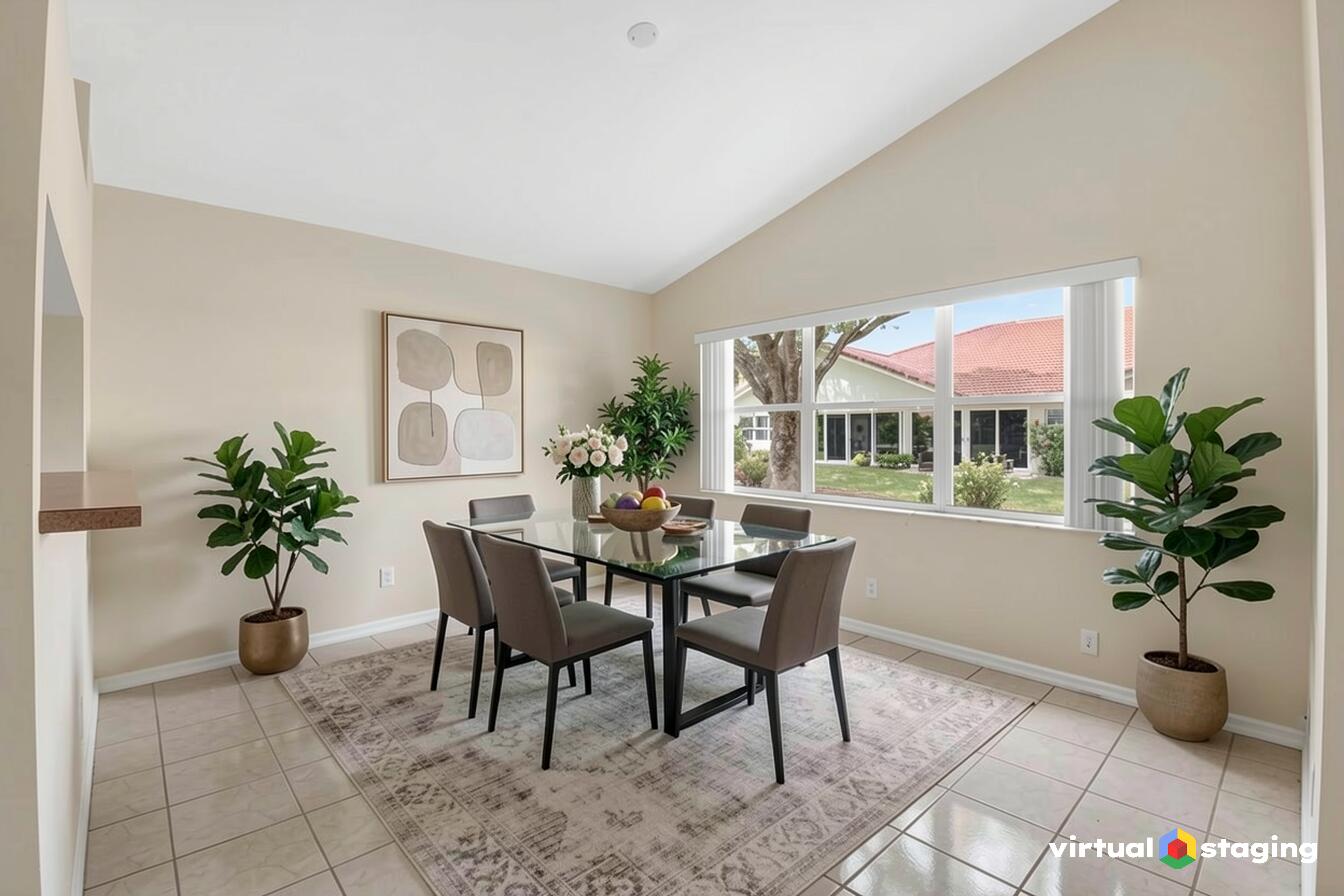 11151 Autoro Court Boca Raton, FL 33498 - Photo 17 of 70 a view of a dining room with furniture and a potted plant