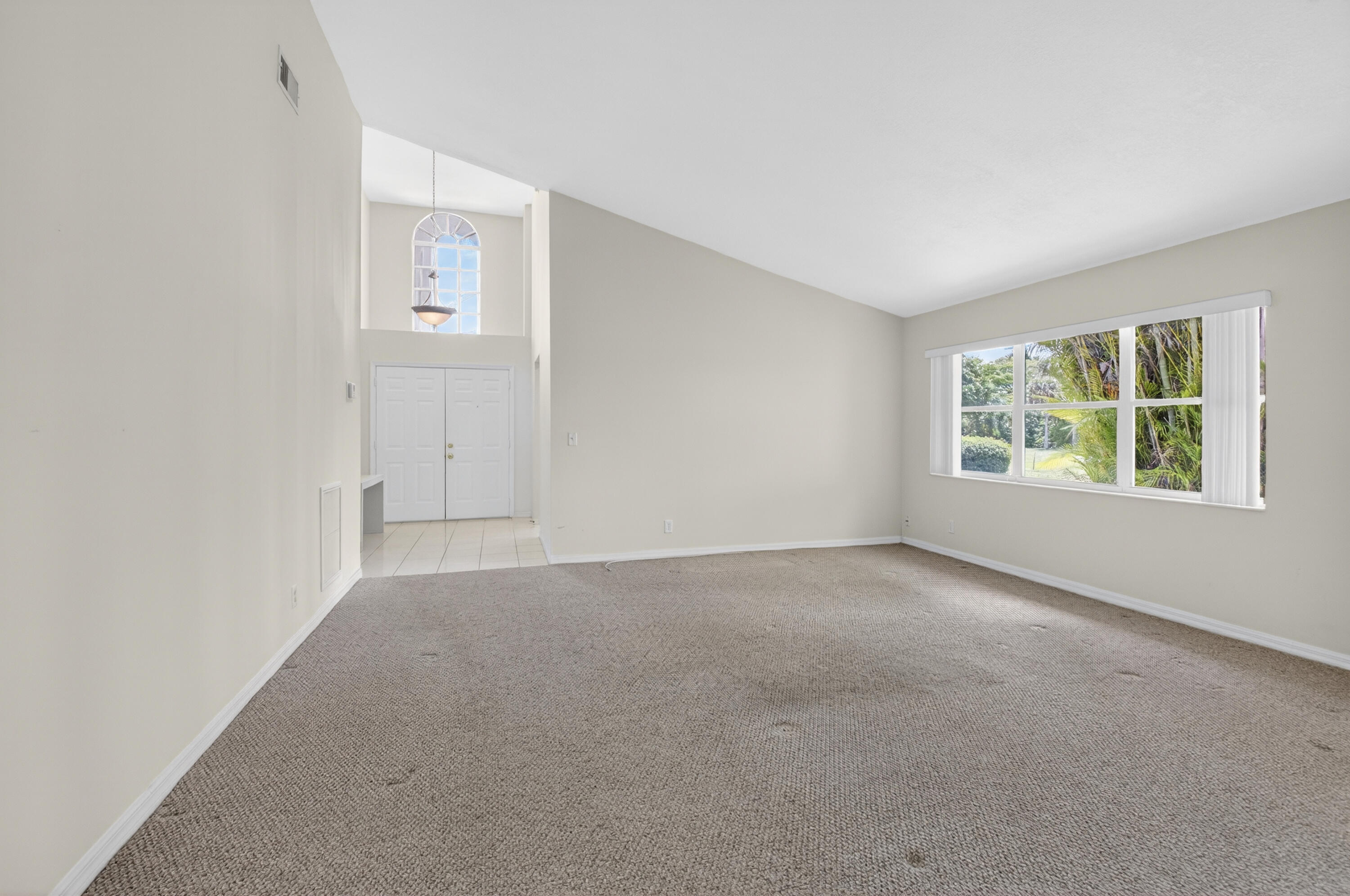 11151 Autoro Court Boca Raton, FL 33498 - Photo 22 of 70 an empty room with windows