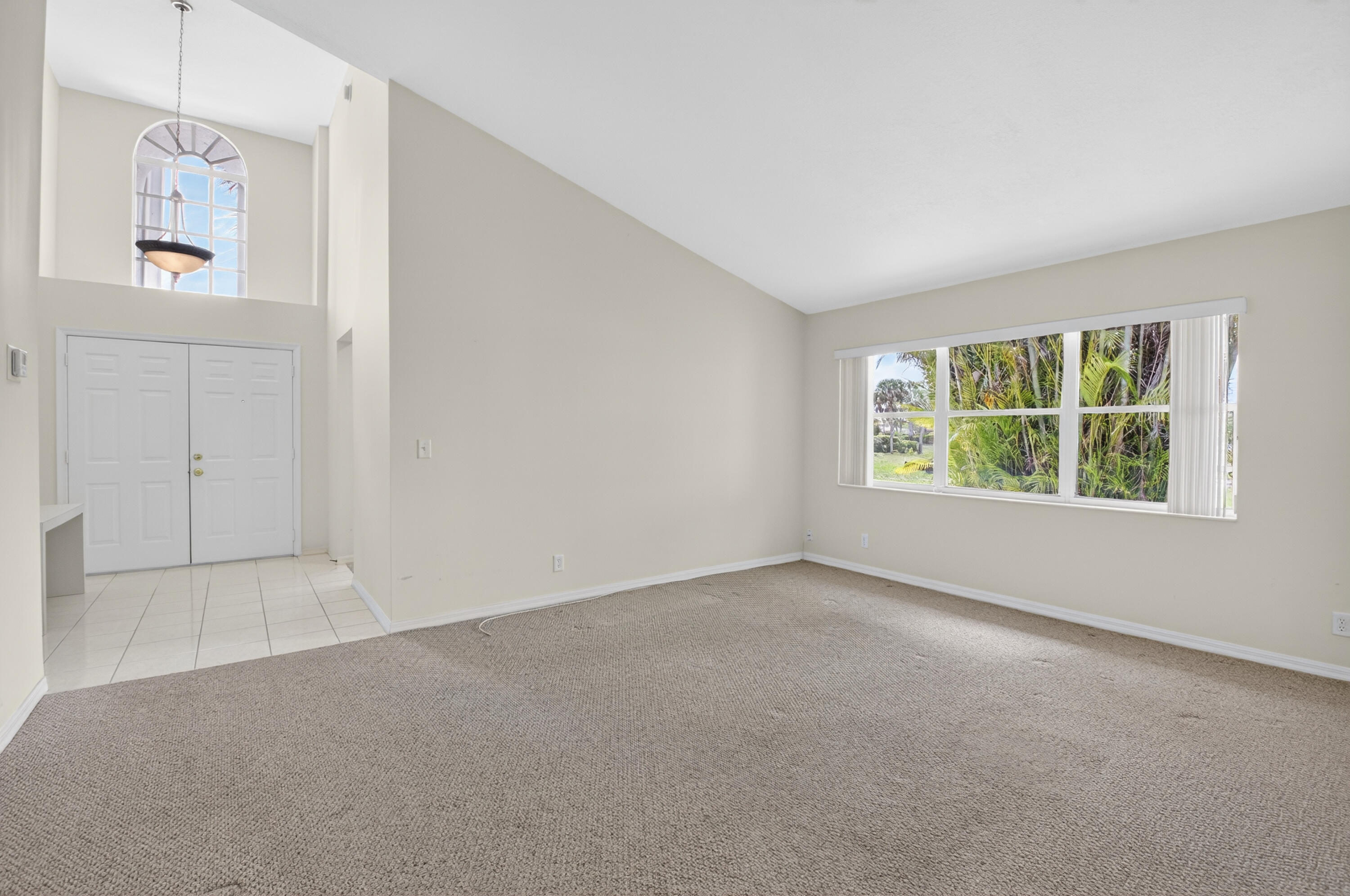 11151 Autoro Court Boca Raton, FL 33498 - Photo 23 of 70 an empty room with windows