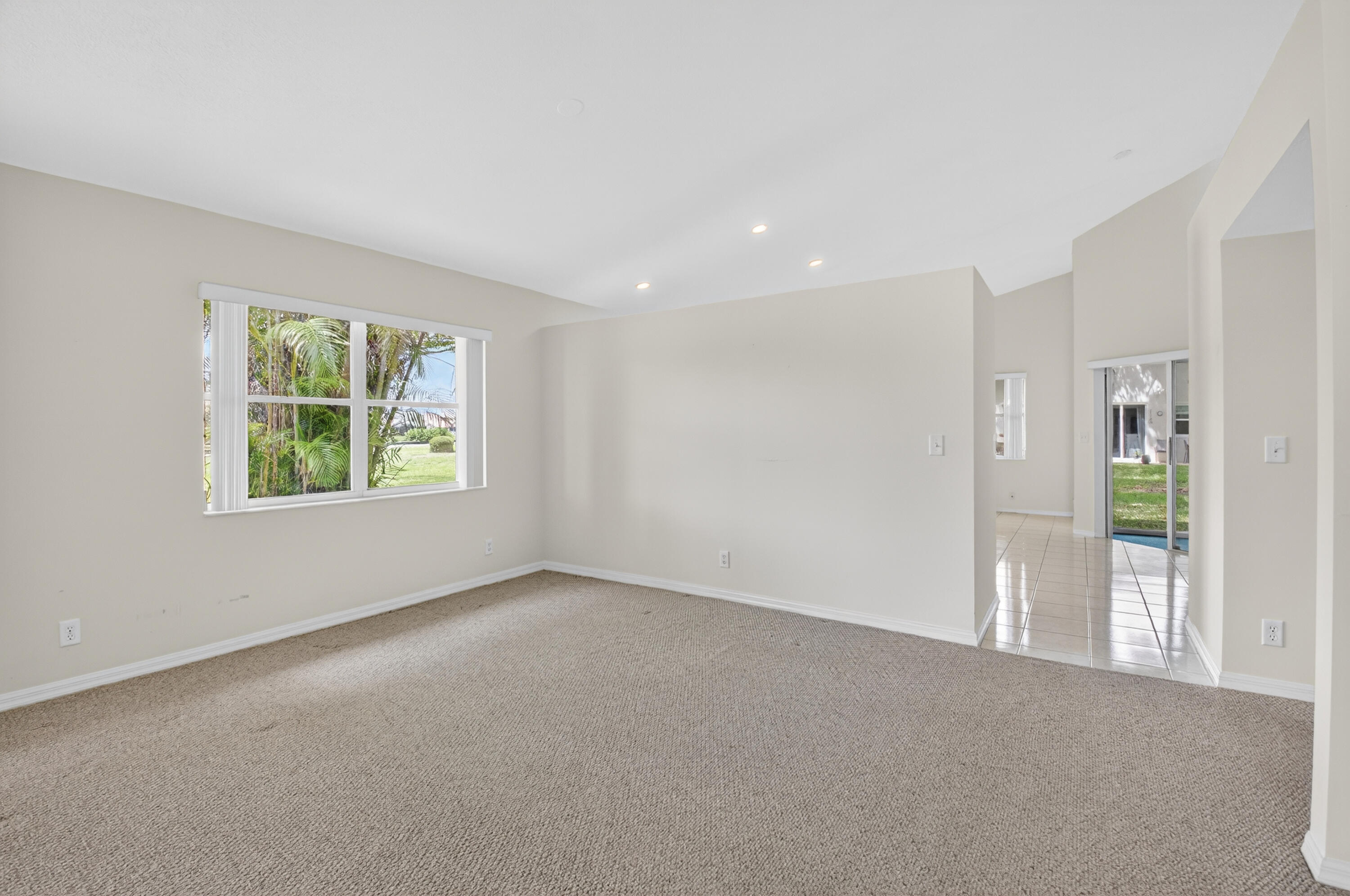 11151 Autoro Court Boca Raton, FL 33498 - Photo 26 of 70 an empty room with windows