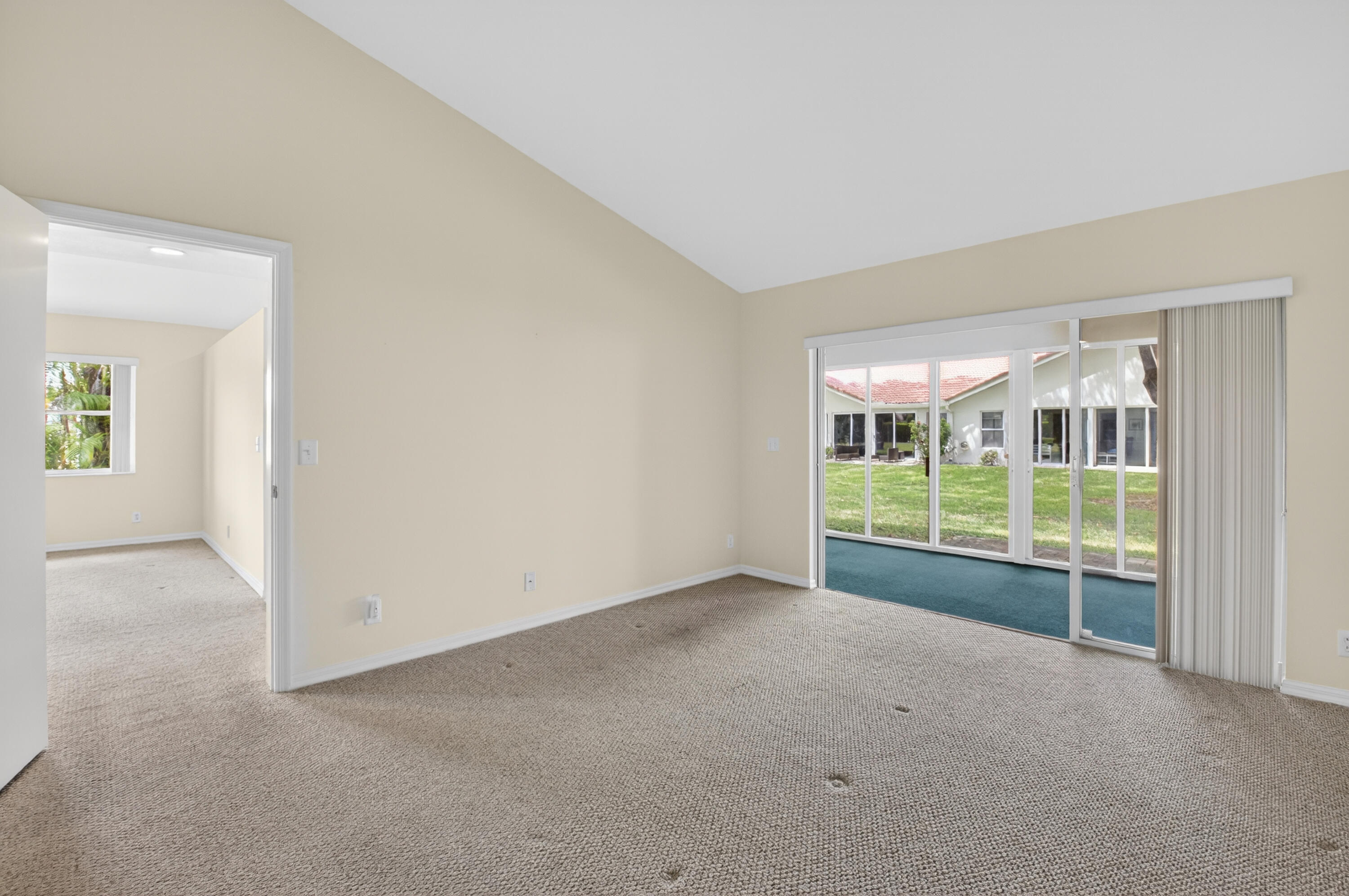 11151 Autoro Court Boca Raton, FL 33498 - Photo 32 of 70 a view of an empty room with glass door and balcony