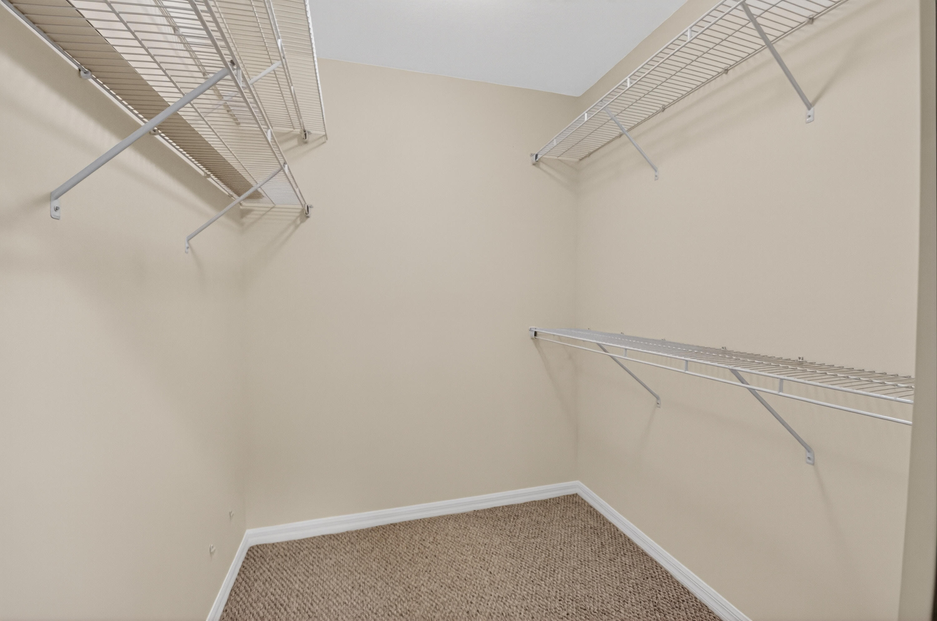 11151 Autoro Court Boca Raton, FL 33498 - Photo 34 of 70 a view of a room with racks on the wall