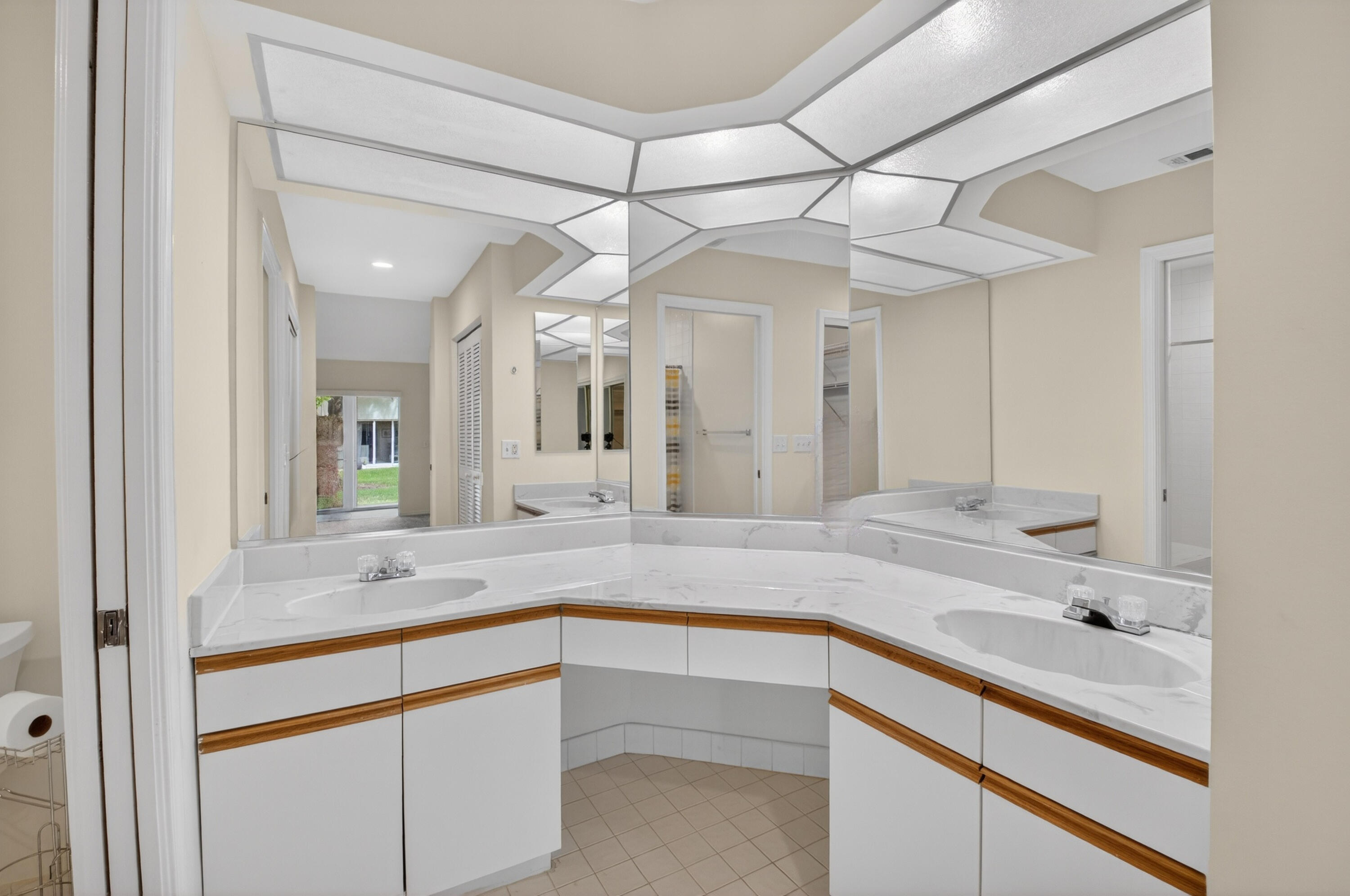 11151 Autoro Court Boca Raton, FL 33498 - Photo 36 of 70 a bathroom with a sink vanity granite tub and shower