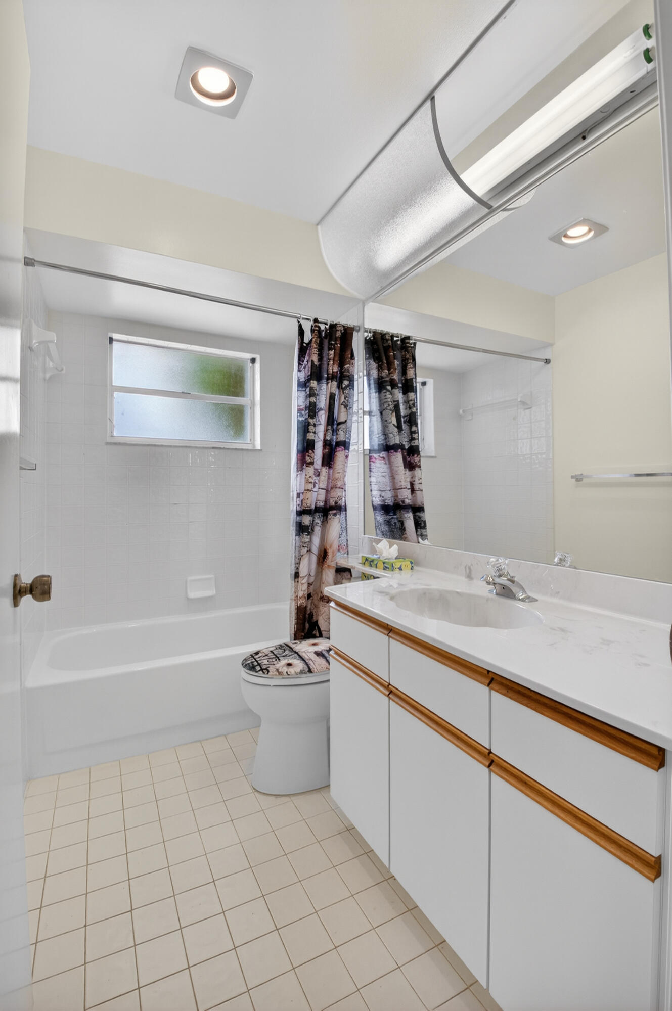 11151 Autoro Court Boca Raton, FL 33498 - Photo 41 of 70 a bathroom with a sink a toilet and shower